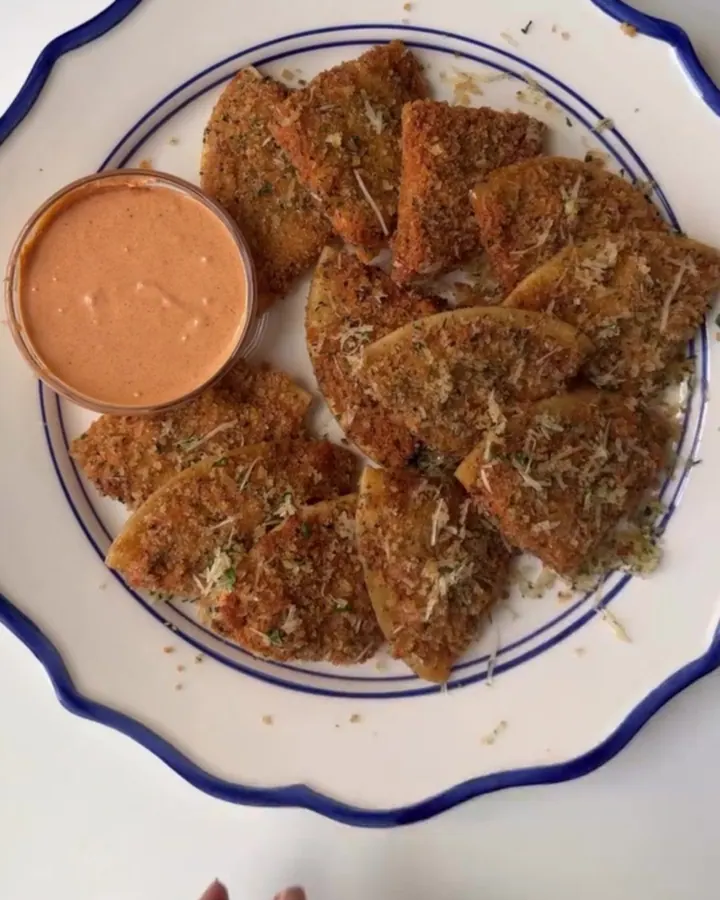 Crispy Parmesan chicken tortilla chips with a creamy smoked paprika dip